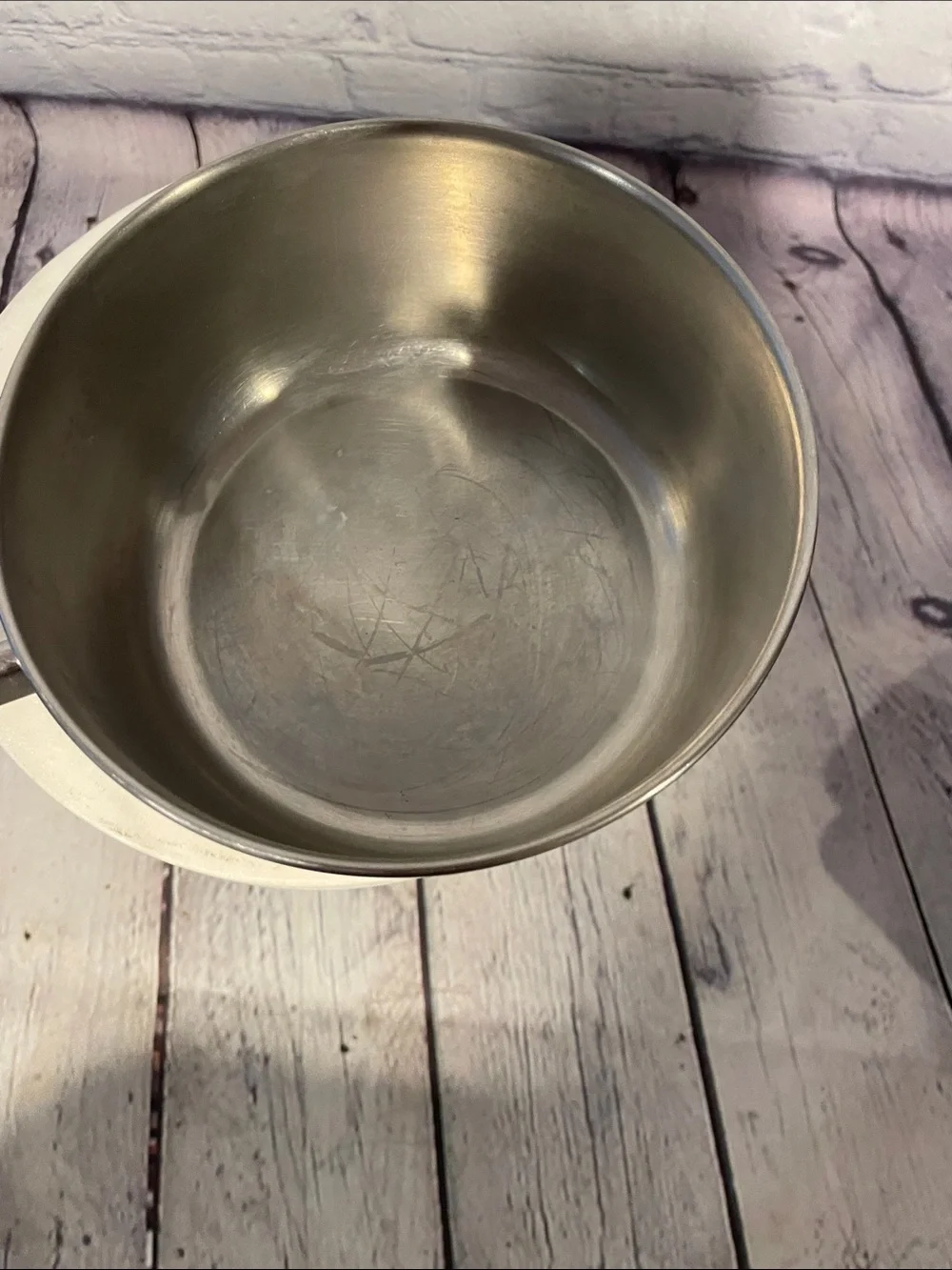 Stainless Steel Saucepan with Black Handle and Copper Base 1Qt.